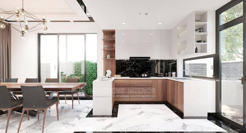 Sự phối hợp hài hòa giữa 2 tone màu chủ đạo trắng và nâu trầm mang đến một không gian nấu nướng tinh tế và không kém phần sang trọng. Thiết kế phòng bếp hiện đại