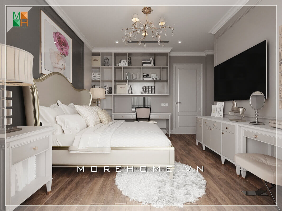 Mẫu thiết kế nội thất phòng ngủ chung cư tân cổ điển là sự chắt lọc tinh túy từ cổ điển, cộng thêm nét phóng khoáng của con người hiện đại. Điều đó thể qua sự sáng tạo thiết kế chiếc giường với họa tiết uốn lượn điêu luyện phía đầu giường kết hợp với kệ tivi và kệ giá sách hiện đại tạo nên một không gian phòng ngủ đẹp mặt, vì thế thiết kế nội thất phòng ngủ tân cổ điển luôn đem đến những giá trị tuyệt vời và hoàn hảo. Mẫu nội thất chung cư tân cổ điển