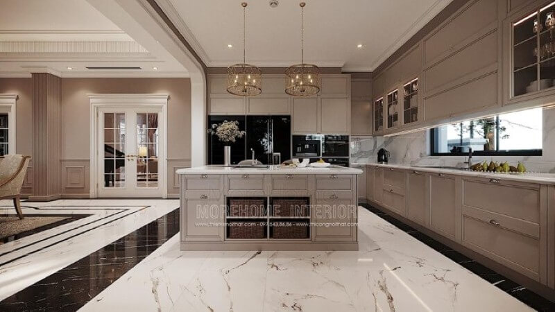 Bàn đảo bếp tân cổ điển ốp đá đẹp sang trọng với thiết kế nhiều hộc tủ cùng các ô mở giúp không gian trở nên linh động, tiện nghi. Gợi ý thiết kế phòng bếp đẹp và sang trọng