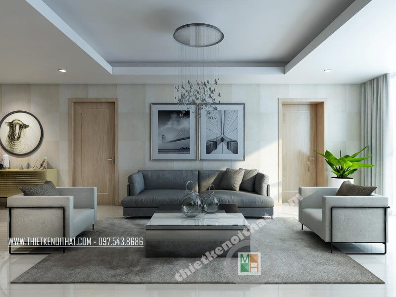 Mẫu thiết kế phòng khách chung cư sang trọng với bộ sofa bọc vài màu xám và trắng tạo điểm nhấn nổi bật cho căn phòng. Thiết kế phòng khách chung cư