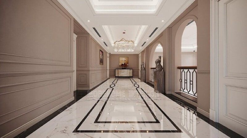 Thiết kế hành lang đẹp ấn tượng từ sàn lát đá cao cấp, phào chỉ tường đẹp cùng đèn trang trí pha lê ấn tượng.
